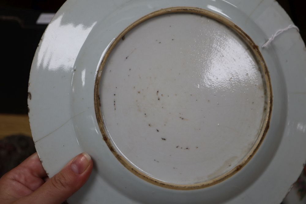 A collection of Oriental chargers and plates,